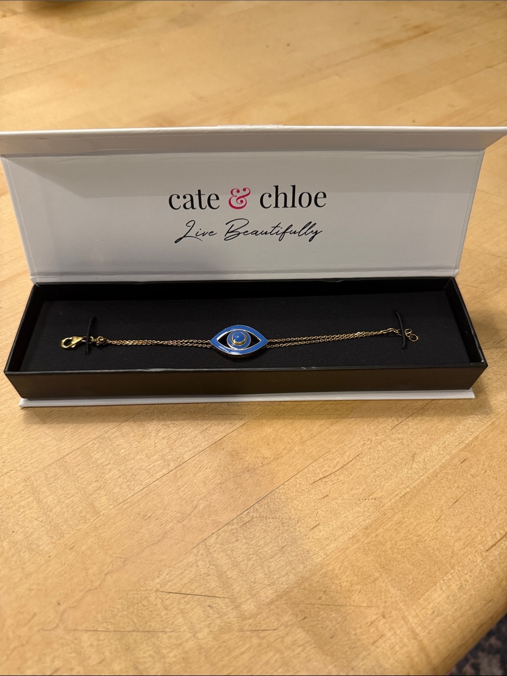 Cate & Chloe Gold Chain Bracelet with Blue Evil Eye Charm